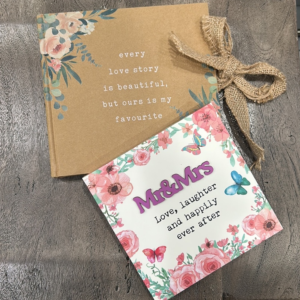 Cute photo album and decorative picture for newlyweds